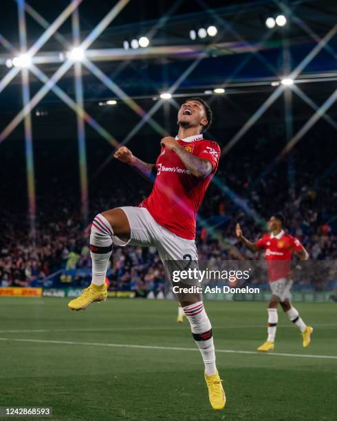 Jadon Sancho of Manchester United celebrates scoring a goal to make the score 0-1 during the Premier League match between Leicester City and...