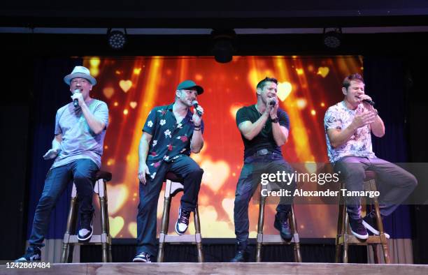 Justin Jeffre, Drew Lachey, Jeff Timmons and Nick Lachey perform on stage during the 98 Degrees Ultimate Throwback Concert at Beaches Turks & Caicos...