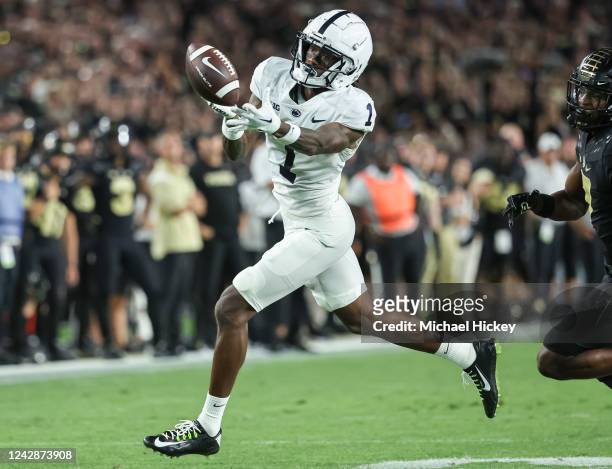 KeAndre Lambert-Smith of the Penn State Nittany Lions bobbles a pass during the first half against the Purdue Boilermakers at Ross-Ade Stadium on...