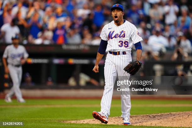 Edwin Díaz of the New York Mets reacts after pitching in the eighth inning during the game between the Los Angeles Dodgers and the New York Mets at...