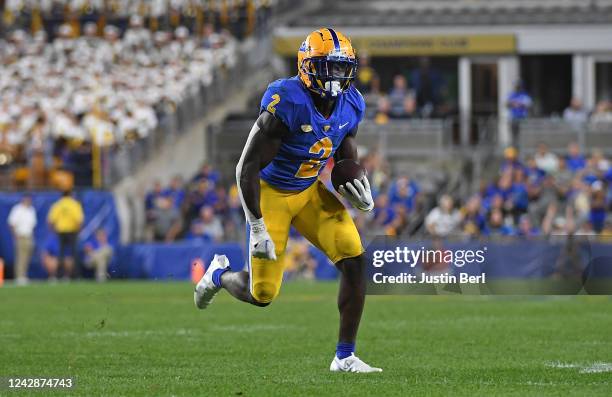 Israel Abanikanda of the Pittsburgh Panthers runs upfield after a catch for a 24-yard touchdown reception in the fourth quarter during the game...