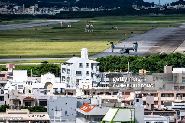 This photo taken on August 23, 2022 shows a US military Osprey aircraft at the US Marine Corps Air Station Futenma in the centre of the city of...