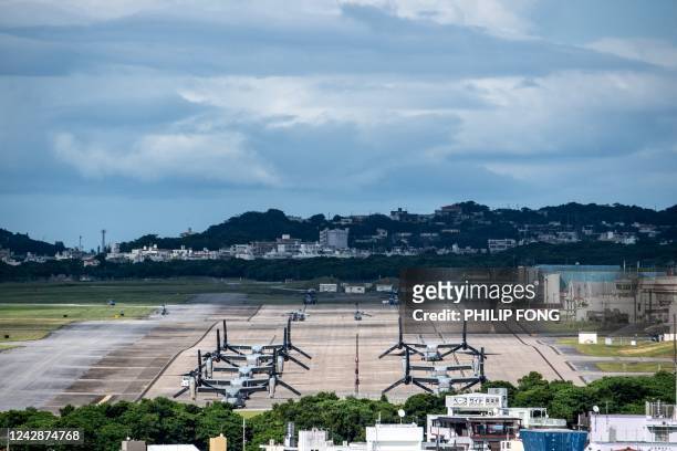 This photo taken on August 23, 2022 shows US military Osprey aircraft at the US Marine Corps Air Station Futenma in the centre of the city of...