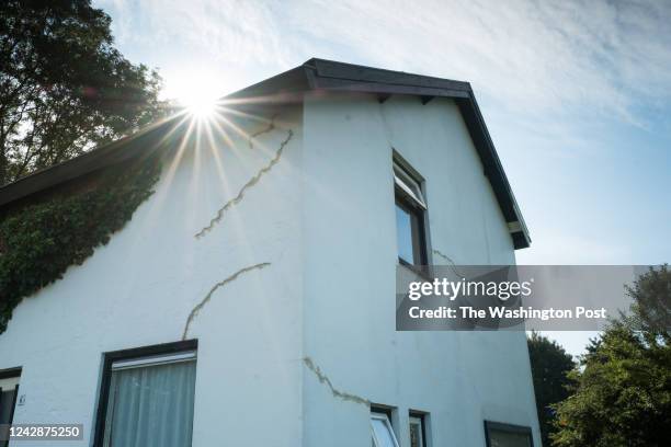 Cracks caused by earthquakes are visible on the outside of the house owned by Frederik Schulte Ostermann in Usquert, Groningen province, the...