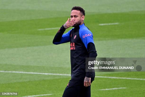 Paris Saint-Germain's Brazilian forward Neymar takes part in a training session at the 'Camp des Loges', French L1 Paris Saint-Germain football...