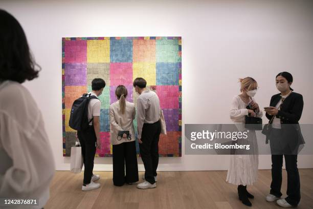 Visitors view McArthur Binion's artwork during the opening event for his "DNA:Study" exhibition at Lehmann Maupin gallery in Seoul, South Korea, on...