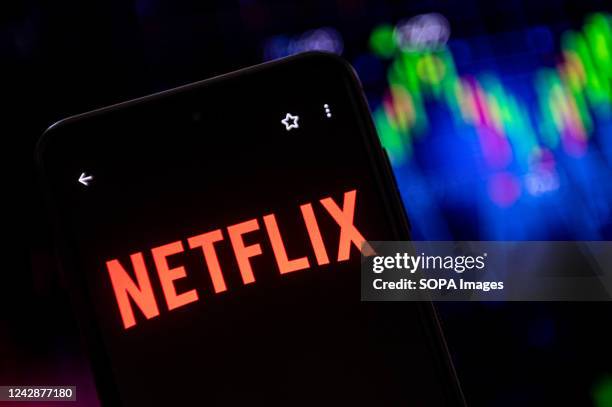 In this photo illustration a Netflix logo seen displayed on a smartphone.