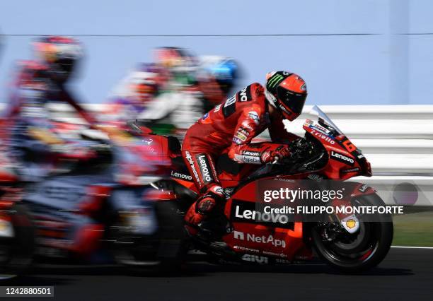 Ducati Lenovo Racing team Italian rider Francesco Bagnaia tries a start during a free practice session of the San Marino MotoGP Grand Prix at the...