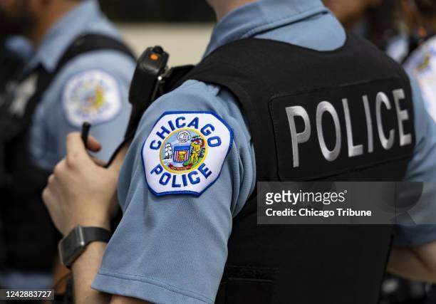 Chicago police officers in the West Englewood neighborhood of Chicago on Aug. 11, 2022.