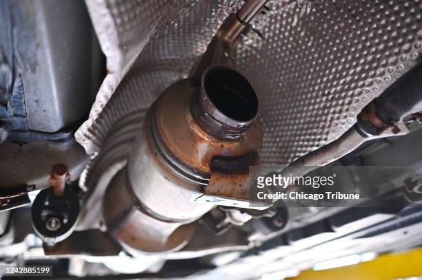 The underside of a Toyota Prius where a catalytic converter was stolen by thieves, at Militoâs Auto Repair in Lincoln Park on Aug. 24, 2022.