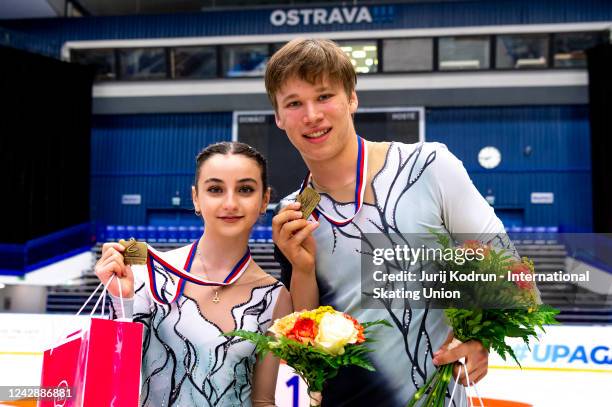 Gold medal winners Sophia Baram and Daniel Tioumentsev of USA pose with medals after the ISU Junior Grand Prix of Figure Skating at Ostravar Arena on...