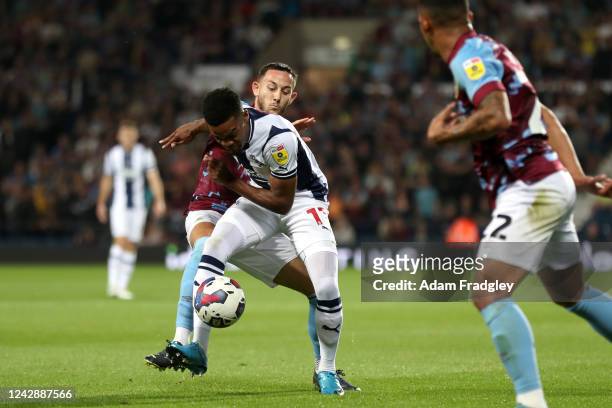 Grady Diangana of West Bromwich Albion and Josh Brownhill of Burnley during the Sky Bet Championship between West Bromwich Albion and Burnley at The...