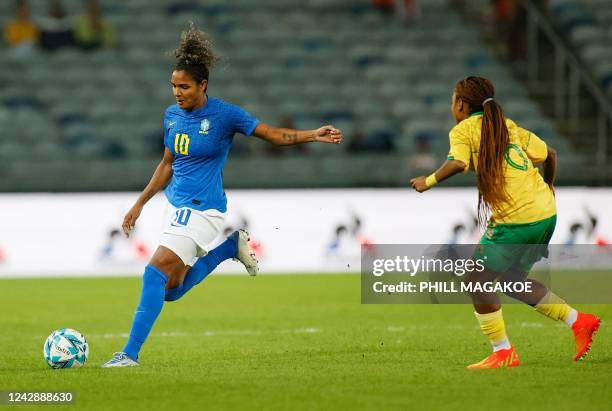 Brazils Maria da Silva controls the ball from South Africas Thalea Smidt during the women's international friendly football match between South...