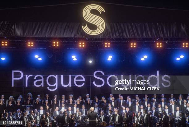 Musicians of Czech Philharmonic Orchestra perform on a floating stage on the Vltava River on the occasion of the Czech Presidency of the Council of...