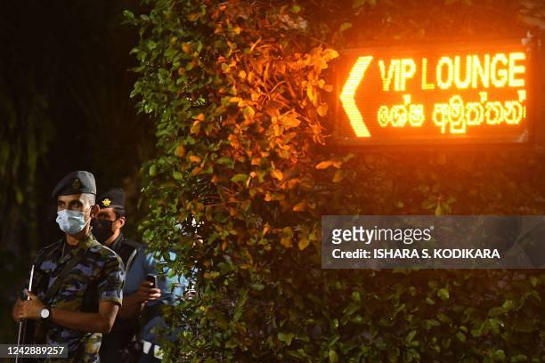Air force personnel stand guard at the entrance of Bandaranaike International Airport in Colombo on early September 3, 2022. - Sri Lanka's deposed...