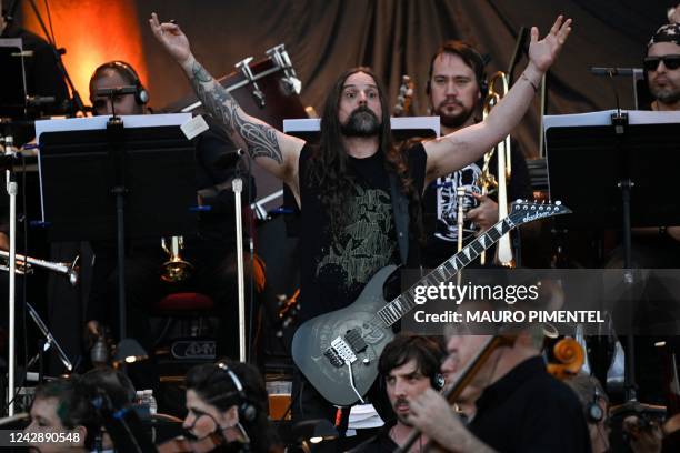 Sepultura's Brazilian guitarist Andreas Kisser performs during the concert with the Brazilian Simphony Orchestra at the Main Stage of the Rock in Rio...