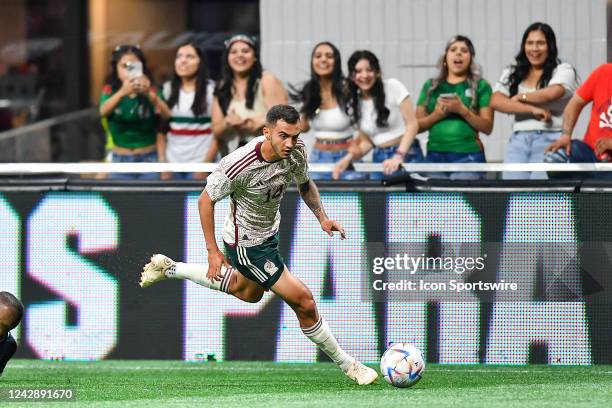 Mexico midfielder Luis Chavez pushes the ball up the field during the international friendly match between Paraguay and Mexico on August 31st, 2022...