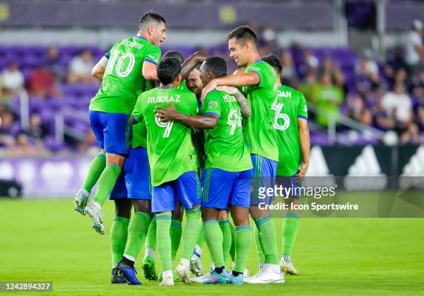 Seattle Sounders midfielder Albert Rusnák scores a goal against Orlando City goalkeeper Pedro Gallese during the MLS soccer match between the Orlando...