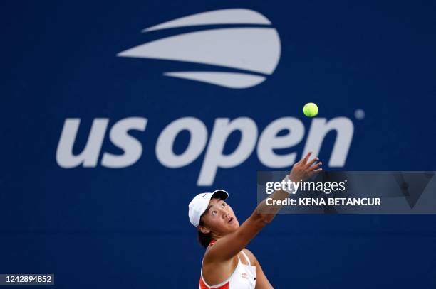 China's Wang Xinyu serves to USA's Alison Riske during their 2022 US Open Tennis tournament women's singles third round match at the USTA Billie Jean...