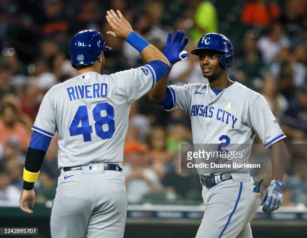 Michael A. Taylor of the Kansas City Royals celebrates with Sebastian Rivero after hitting a two-run home run against the Detroit Tigers during the...
