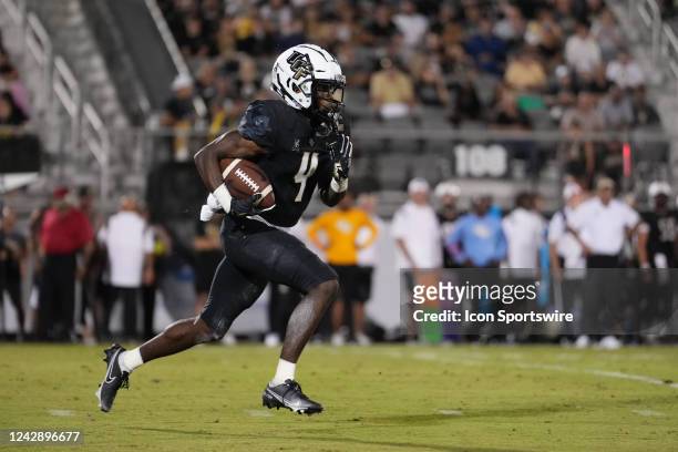 Knights wide receiver Ryan O'Keefe returns a kick off during the game between the South Carolina State Bulldogs and the University of Central Florida...