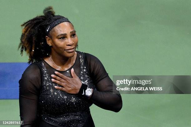 S Serena Williams gestures to the audience after losing against Australia's Ajla Tomljanovic during their 2022 US Open Tennis tournament women's...