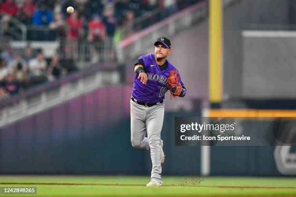 Colorado shortstop Jose Iglesias throws to first base during the MLB game between the Colorado Rockies and the Atlanta Braves on September 1st, 2022...