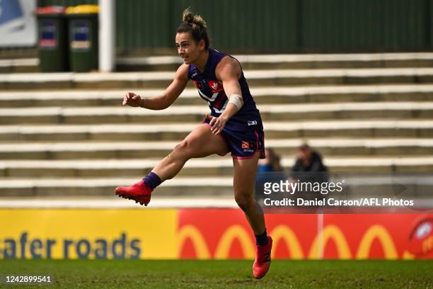 Angelique Stannett of the Dockers kicks the ball during the 2022 S7 AFLW Round 02 match between the Fremantle Dockers and the Geelong Cats at...