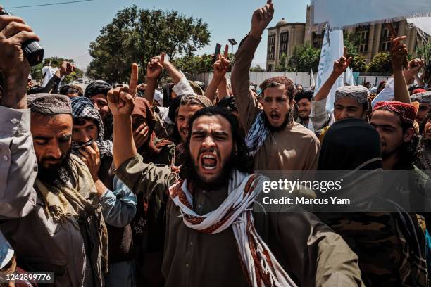 Members and supporters of the Taliban gather to commemorate the one year anniversary of the United StatesÕ military withdrawal after a 20-year...