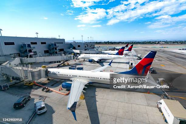 Delta Airlines airplanes prepare for boarding at Los Angeles International Airport on September 02, 2022 in Los Angeles, California.