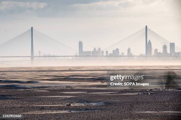Exposed banks, due to low water levels caused by drought, along the Yangtze River. China has been hit by its most severe heatwave in six decades,...