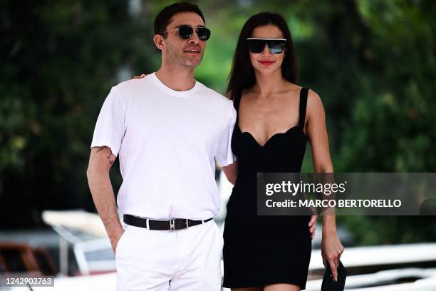 British actor Ed Westwick and Indian-British actress Amy Jackson arrive at the pier of the Excelsior Hotel on September 3, 2022 during the 79th...