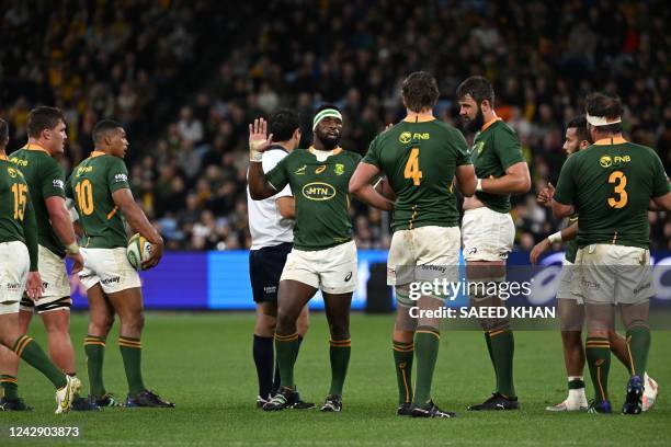 South Africa's Siya Kolisi cools down his teammates after a fight with Australia's players during the Rugby Championship match between Australia and...