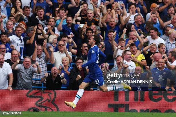 Chelsea's English defender Ben Chilwell celebrates after scoring his team first goal during the English Premier League football match between Chelsea...