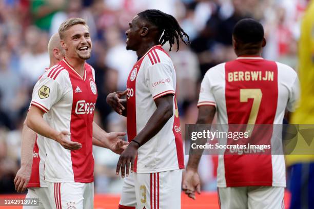 Kenneth Taylor of Ajax celebrates 3-0 with Calvin Bassey of Ajax during the Dutch Eredivisie match between Ajax v SC Cambuur at the Johan Cruijff...