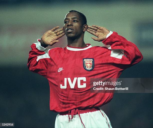 Ian Wright of Arsenal listens to the cheers of the supporters after he scored in the Coca Cola Cup quarter final match against Newcastle at Highbury.