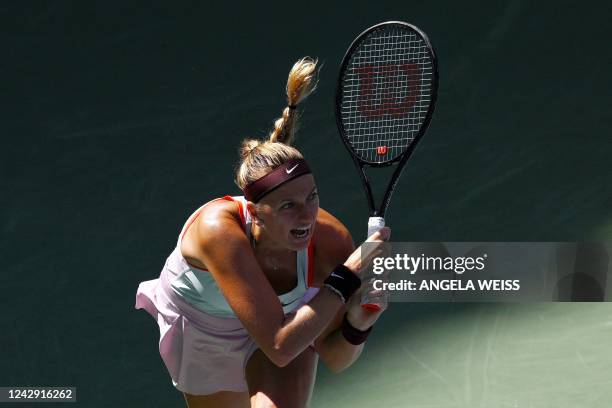 Czech Republic's Petra Kvitova hits a return to Spain's Garbine Muguruza during their 2022 US Open Tennis tournament women's singles third round...