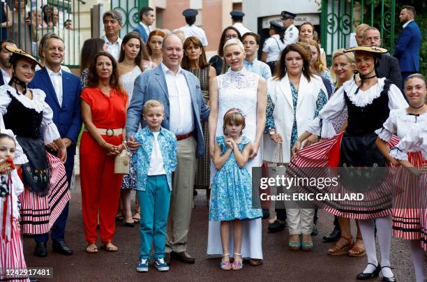 Prince Albert II , Princess Charlene , Prince Jacques , and Princess Gabriella of Monaco arrive to take part in the traditional "U Cavagnetu" Monaco...