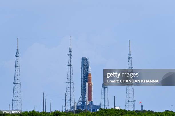 The Artemis I unmanned lunar rocket sits on launch pad 39B after its launch was postponed, at NASA's Kennedy Space Center in Cape Canaveral, Florida,...