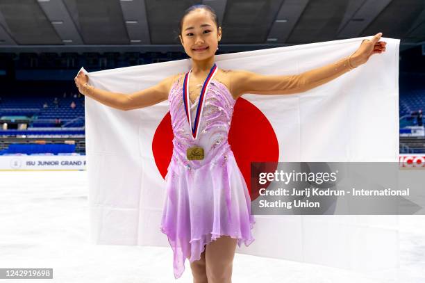 Gold medal winner Mao Shimada of Japan poses with medal and flag after the ISU Junior Grand Prix of Figure Skating at Ostravar Arena on September 3,...