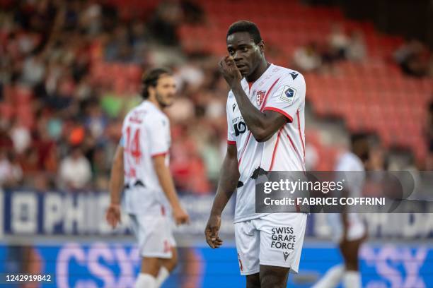 Sion's Italian forward Mario Balotelli reacts during his Swiss super league football match FC Sion against FC Basel at the Tourbillon stadium in...