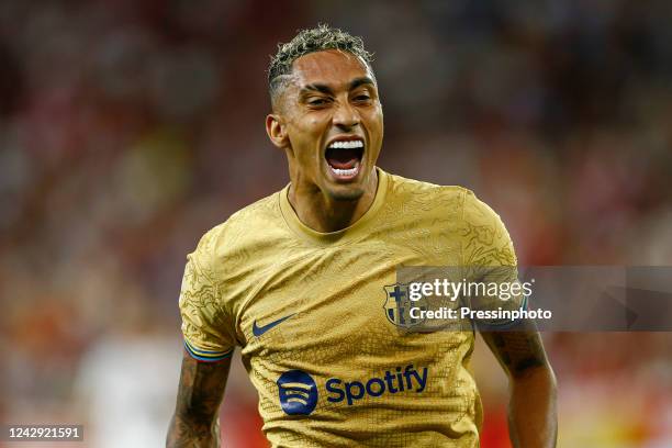 Raphinha Dias Belloli of FC Barcelona celebrates after scoring the opening goa during the La Liga match between Sevilla FC and FC Barcelona played at...