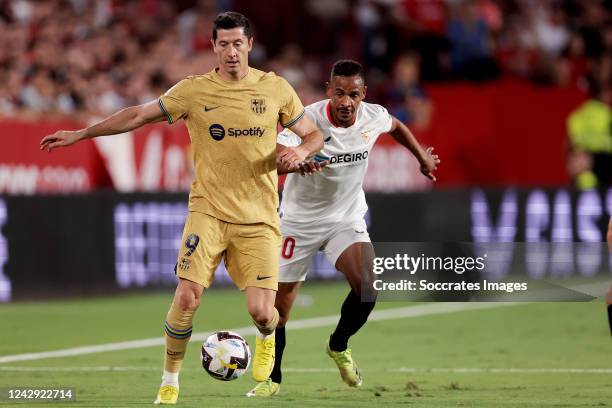 Robert Lewandowski of FC Barcelona, Fernando of Sevilla during the La Liga Santander match between Sevilla v FC Barcelona at the Estadio Ramon...