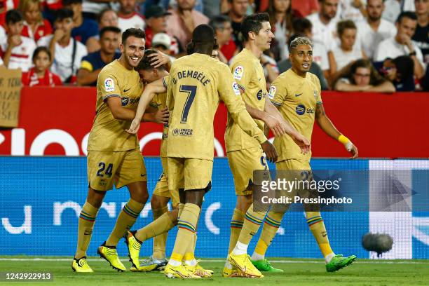 Eric Garcia of FC Barcelona celebrates with his teammates after scoring the 0-3 during the La Liga match between Sevilla FC and FC Barcelona played...