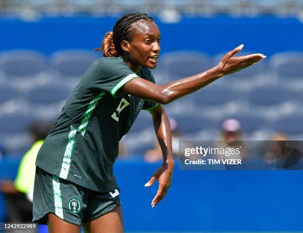 Nigeria's forward Ifeoma Onumonu instructs teammates during their women's international friendly football match between the USA and Nigeria at...