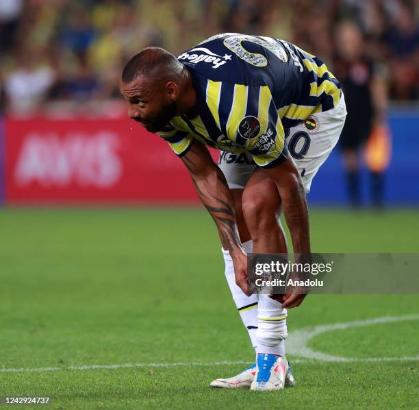 Joao Pedro of Fenerbahce wears his shin guard with a photo of Michael Jordan during Turkish Super Lig week 5 soccer match between Fenerbahce and...