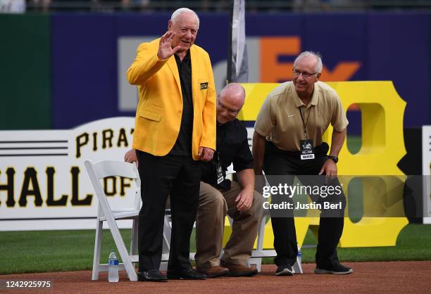 Bill Mazeroski waves to the crowd during a ceremony for the inaugural Pittsburgh Pirates Hall of Fame class before the game between the Pittsburgh...