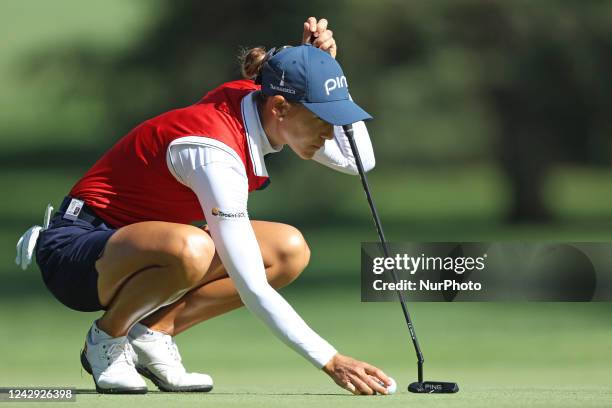 Azahara Munoz of Spain lines up her putt on the 10th green during the third round of the Dana Open presented by Marathon at Highland Meadows Golf...