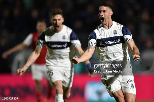 Leandro Morales of Gimnasia y Esgrima celebrates after scoring his team's second goal during a match between Gimnasia y Esgrima La Plata and...