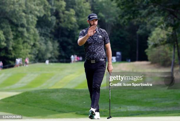 Dustin Johnson, captain of the 4 Aces GC, thanks the crowd on 3 during the second round on Day 2 of the LIV Golf Invitational Series Boston on...